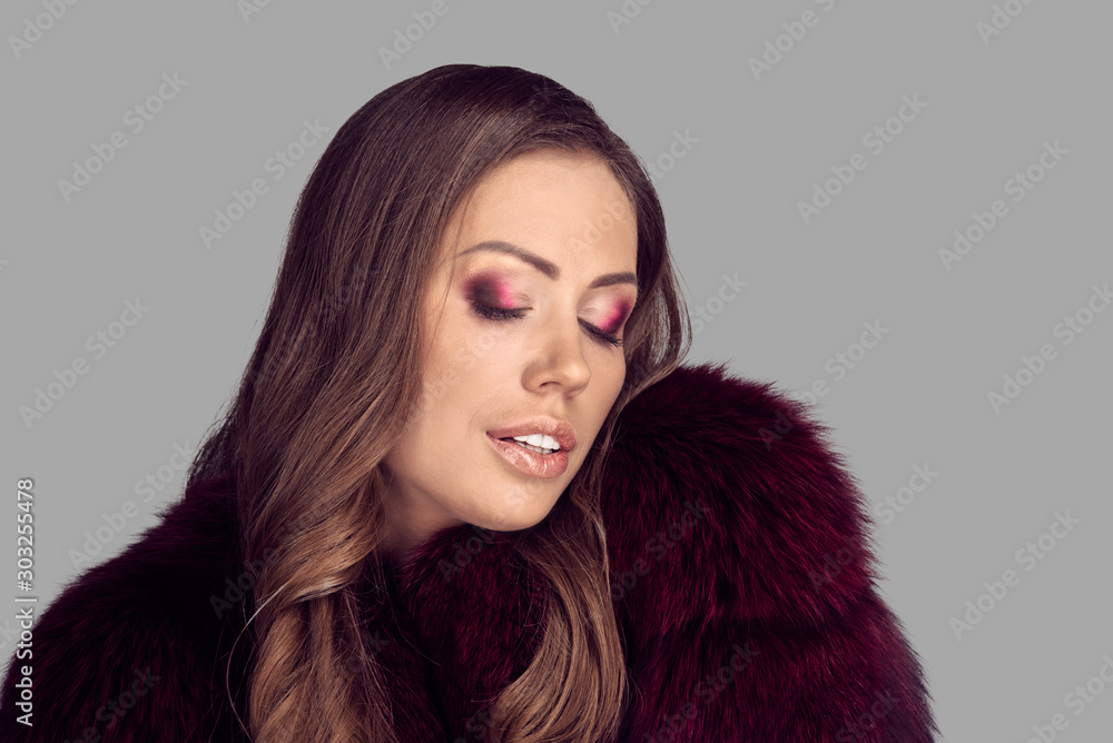Fashion portrait of beautiful elegant woman in luxury fur coat Fashion portrait of beautiful elegant woman in luxury fur coat