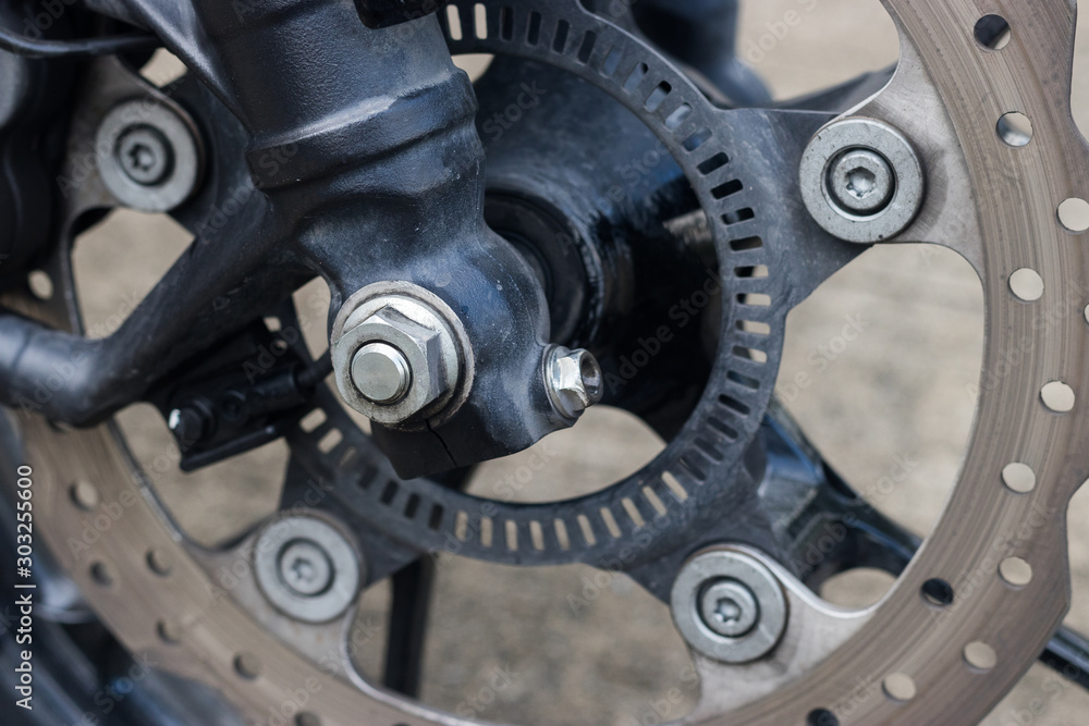 Motorcycle wheel in black and white with ABS brakes. Brake motorcycle. Motorcycle wheel in black and white with ABS brakes. Brake motorcycle.