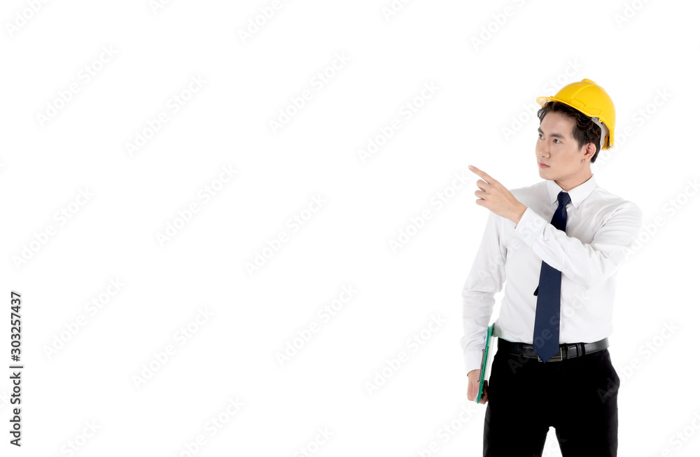Asian construction engineer / site manager with safety hat holding a notepad is pointing upward to advertise, isolated on white background. Asian construction engineer / site manager with safety hat holding a notepad is pointing upward to advertise, isolated on white background.