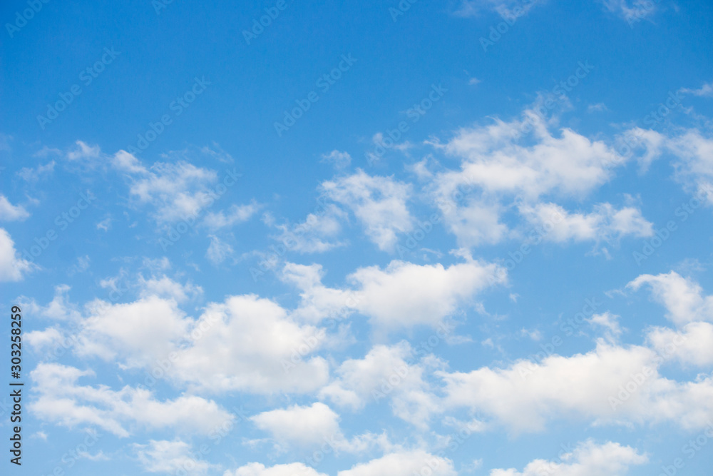 Bright blue sky with white clouds for background or wallpapers Bright blue sky with white clouds for background or wallpapers
