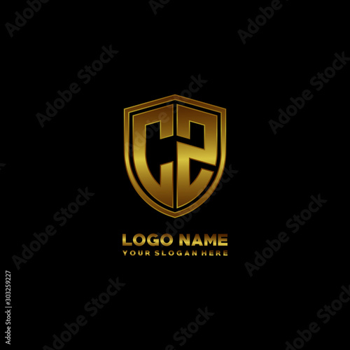 Initial letters CZ shield shape gold monogram logo. Shield Secure Safe logo design inspiration