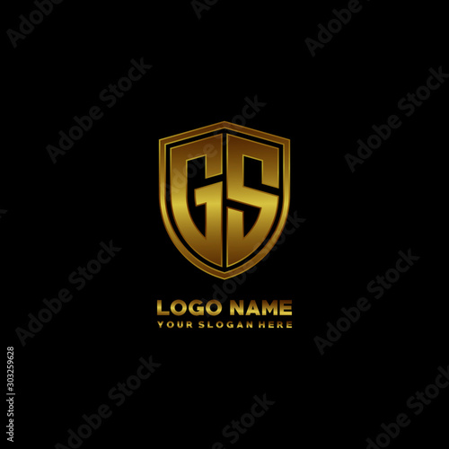 Initial letters GS shield shape gold monogram logo. Shield Secure Safe logo design inspiration