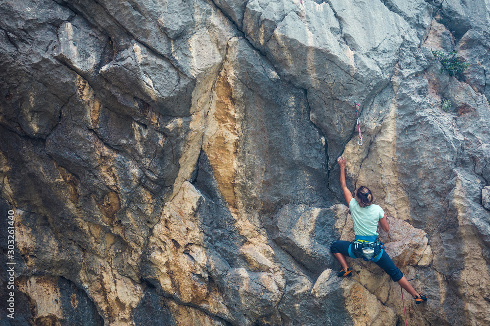 Woman engaged in extreme sport.