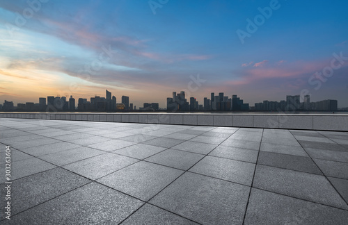 City square and modern architectural scenery at twilight，China