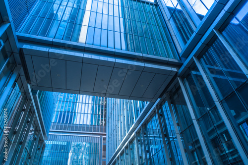 Architecture details Modern Building Glass facade Business background.