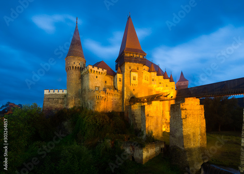 Night landscape with illuminated Corvin Castle, Romania