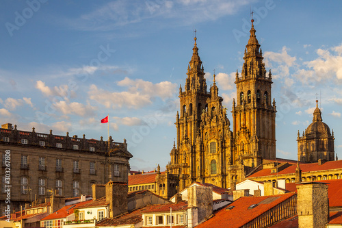 Leinwand Poster Santiago de Compostela Cathedral Towers Close Up with Sun Light Hitting the faca