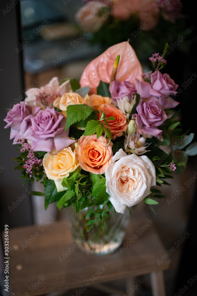 bouquet of flowers. Bouquet of natural fresh roses, tulips, anemones, peonies, ranunculi, matthiola, daffodil, cloves, eucalyptus. A bouquet of flowers is decorated in a composition of flowers bouquet of flowers. Bouquet of natural fresh roses, tulips, anemones, peonies, ranunculi, matthiola, daffodil, cloves, eucalyptus. A bouquet of flowers is decorated in a composition of flowers