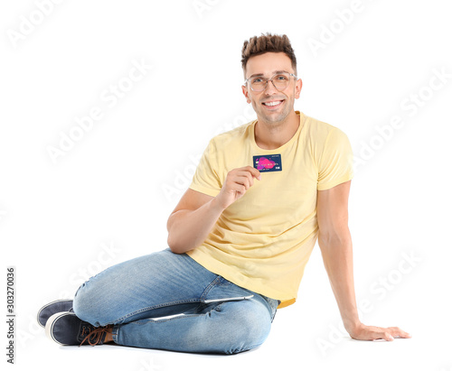 Young man with credit card ...