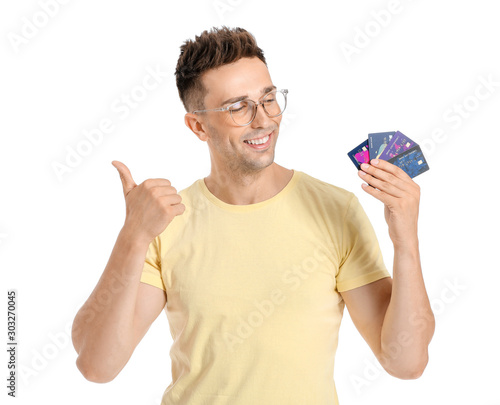 Young man with credit cards...