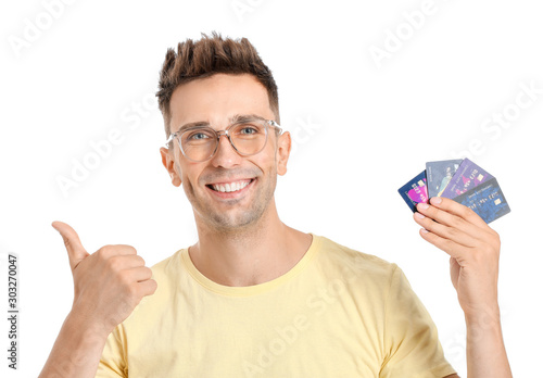 Young man with credit cards...