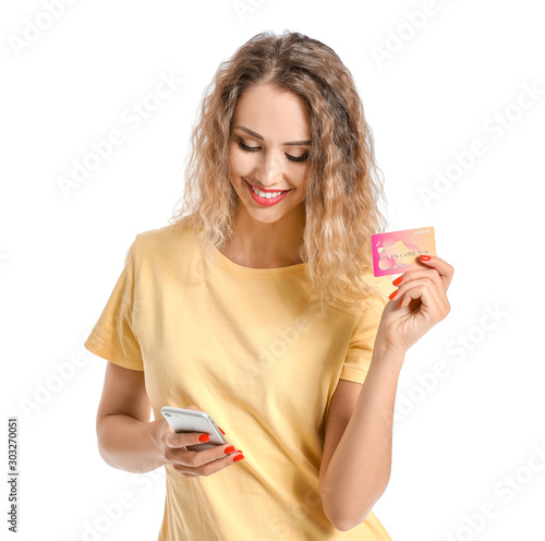 Smiling woman holding credi...
