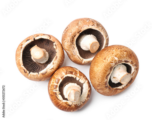 Fresh champignon mushrooms on white background