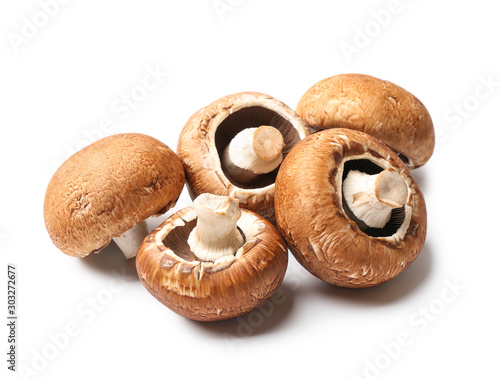 Fresh champignon mushrooms on white background