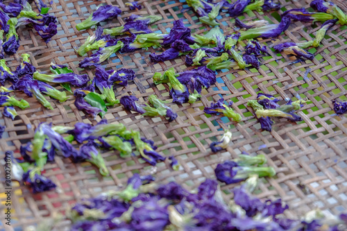 Dried Butterfly Pea in a handmade bamboo basket.