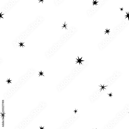 Seamless abstract pattern with black hand drawn shabby stars of different size on white background.