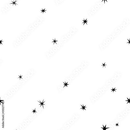 Seamless abstract pattern with black hand drawn shabby stars of different size on white background.