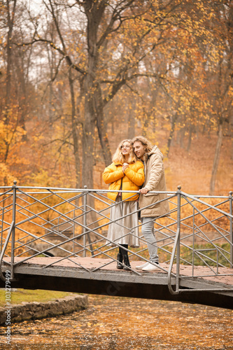 Young couple on bridge in a...
