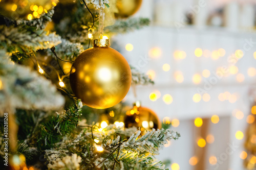Christmas balls on green background with lights
