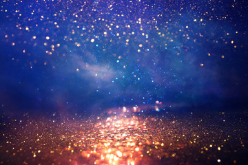 abstract glitter silver, gold , blue lights background. de-focused