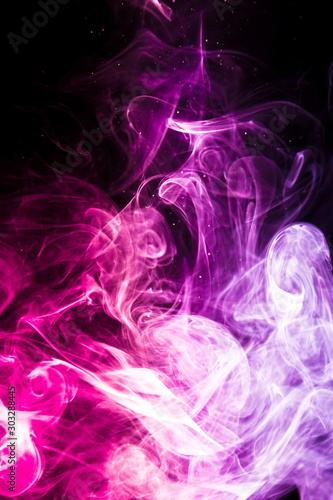 Colored smoke on black background