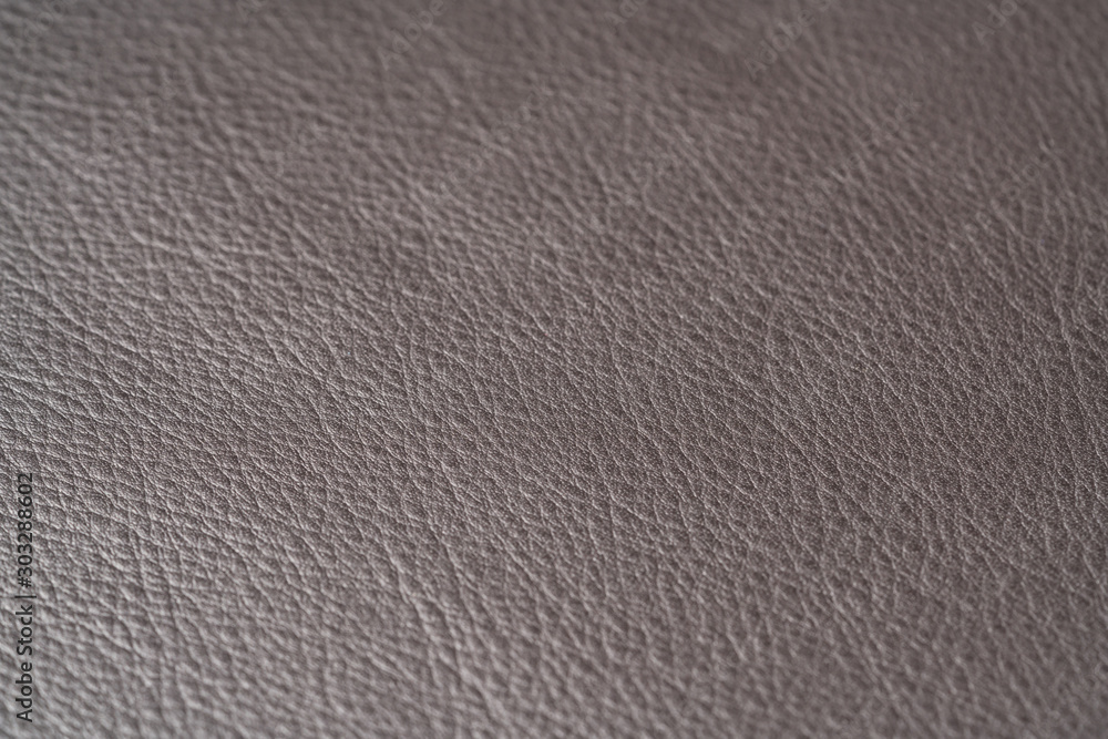 Closeup shot of full garin dark brown full grain leather - obrazy, fototapety, plakaty 