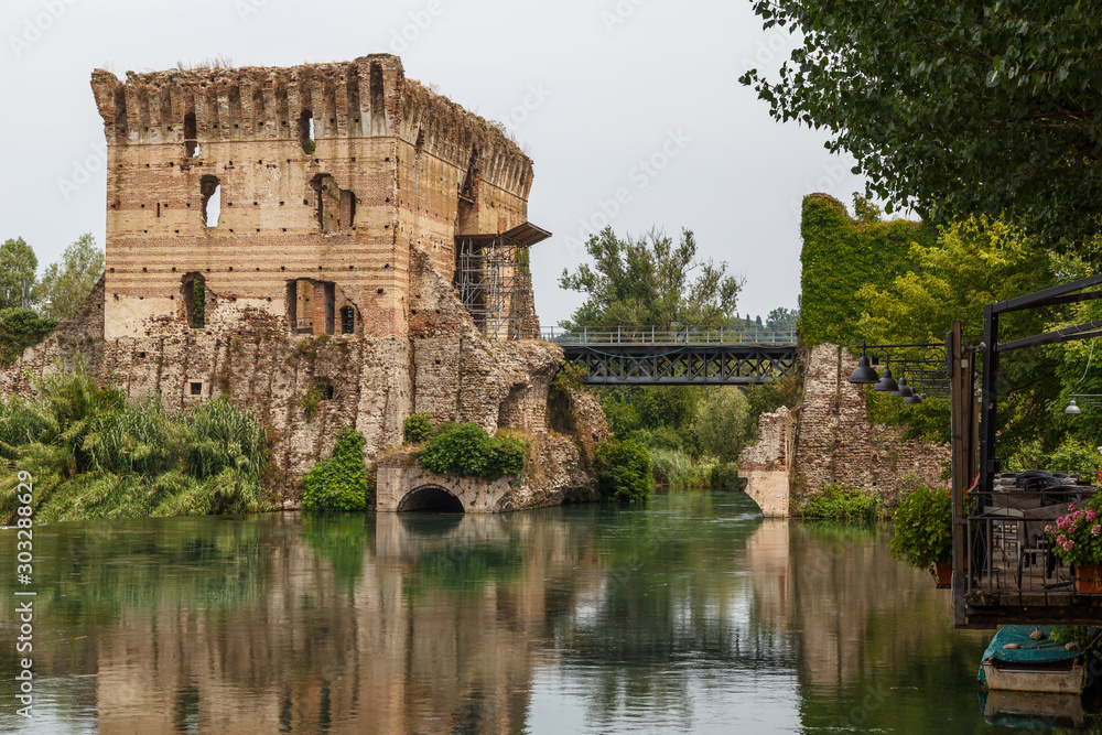 Fototapeta premium Medieval fortifications of Borghetto town, Italy