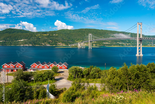 фотографія The Tjeldsund Bridge through Tjeldsundet strait as seen in the direction of Hinnoya Island in Norway