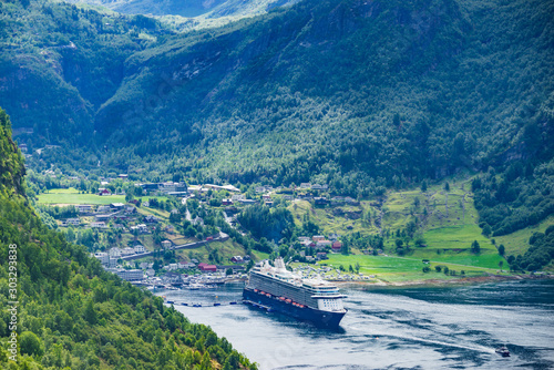 Fjord Geirangerfjord with ferry boat, Norway. photo