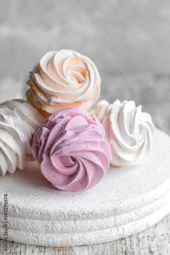 Assorted different flavors of homemade marshmallows. Peach, pink and white marshmallows. Assorted different flavors of homemade marshmallows. Peach, pink and white marshmallows.