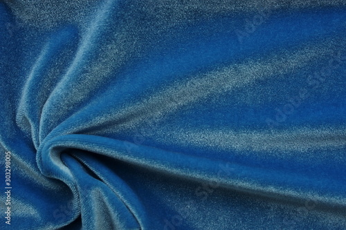 velvet texture blue color background, expensive luxury fabric, wallpaper. copy space
