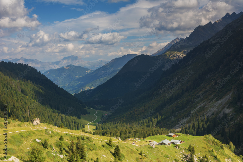 Hiking trails in the French Alps with stunning views of rocky mountains and alpine meadows. Hiking trails in the French Alps with stunning views of rocky mountains and alpine meadows.