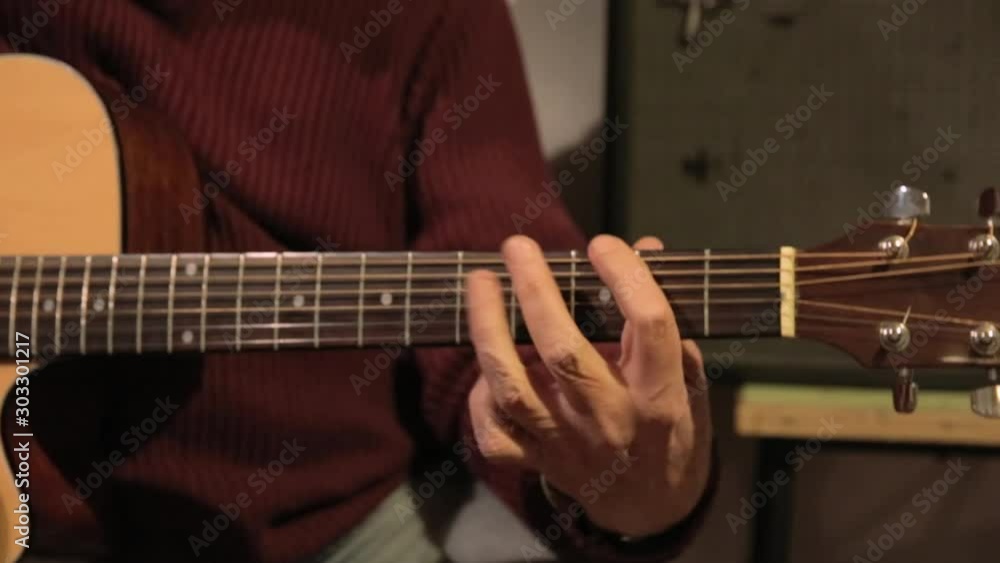 man playing acoustic guitar - solo man playing acoustic guitar - solo