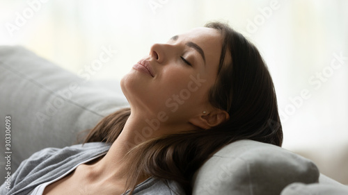 Canvas-taulu Beautiful healthy young woman taking deep breath of fresh air