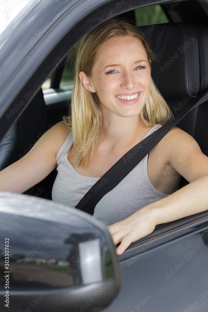 a blond woman in the car