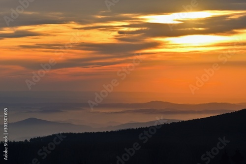 Beautiful landscape and sunset in the mountains. Hills in clouds. Jeseniky - Czech Republic - Europe.