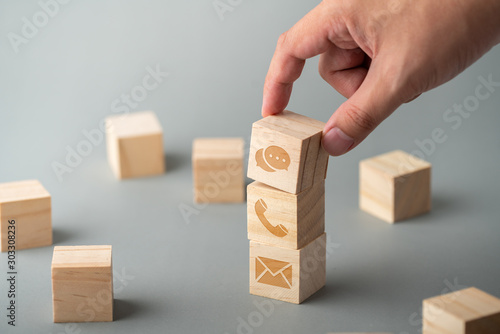 Customer service & contact us icon on the cube wood keyboard