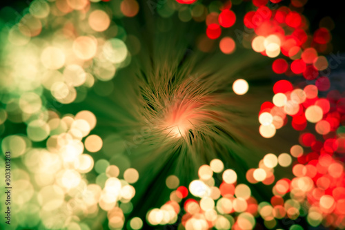 blurred abstract vibrant vintage red and green background with shiny bokeh