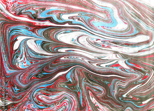 Abstract background with acrylic liquid textures.Hand drawn artwork on water marble paint.fluid colors mix.Ebru suminagashi technique.Design for wallpapers,posters,cards, websites.covers and packaging