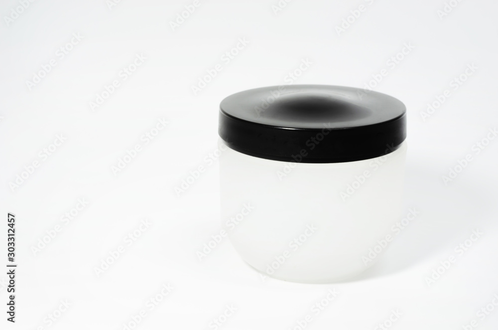 Cosmetic jars, empty packaging, cream pot, transparent cosmetics, isolated on a white background Cosmetic jars, empty packaging, cream pot, transparent cosmetics, isolated on a white background
