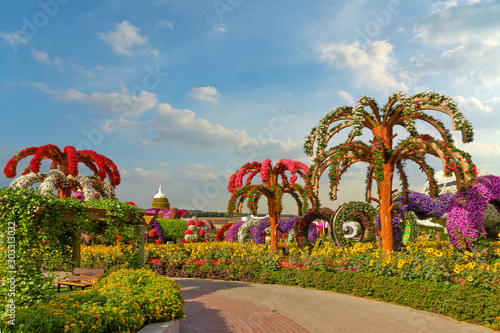 Canvas Print Park decorative trees with flowers, Miracle garden decoration, Dubai, United Arab Emirates