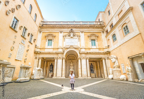 Girl Standing in Capitoline Museum in Capitoline Hill, Rome, Italy photo