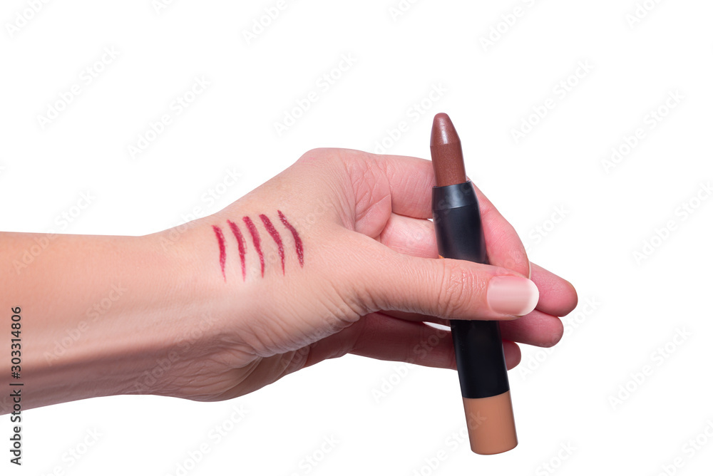 Testing lipstick strikes on hand, different colors, isolated Testing lipstick strikes on hand, different colors, isolated