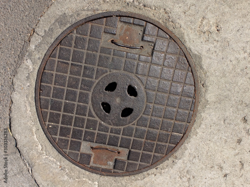 Manhole cover  on the road
