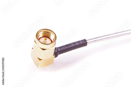 Coax cable 90 degrees angle gold plated SMA connector close up photo