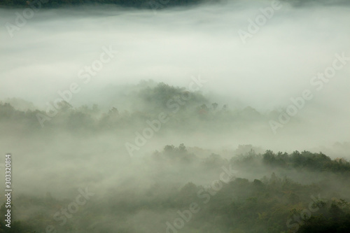 mountains under mist in the morning