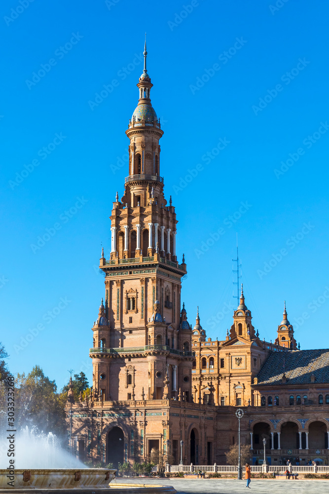 North tower at Spain Square (Plaza de Espana) in Seville (Sevilla) city, Andalusia, Spain. Example of Renaissance revival architecture. Bright Sunny day