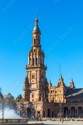North tower at Spain Square (Plaza de Espana) in Seville (Sevilla) city, Andalusia, Spain. Example of Renaissance revival architecture. Bright Sunny day