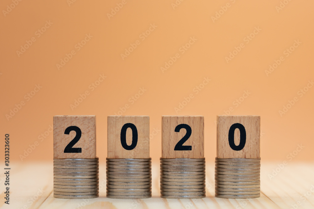 Φωτογραφία 2020 New year made from wooden blocks on orange background for money, finance and business investment concept
