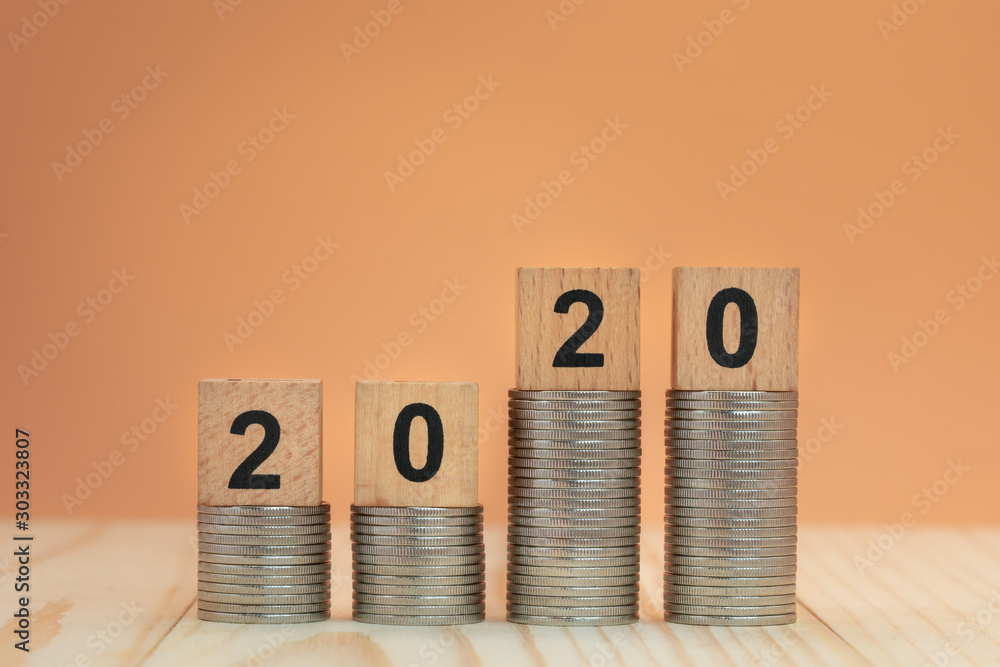 Φωτογραφία 2020 New year made from wooden blocks on orange background for money, finance and business investment concept